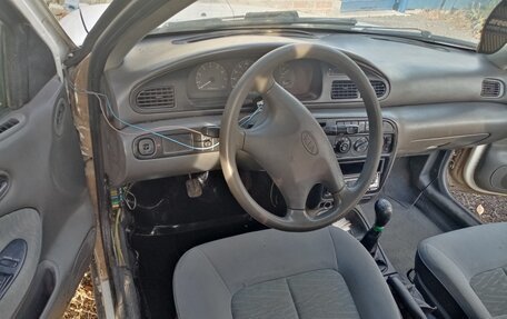 KIA Sephia I рестайлинг, 1996 год, 100 000 рублей, 5 фотография