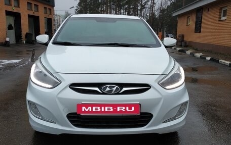 Hyundai Solaris II рестайлинг, 2013 год, 21 фотография