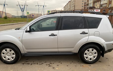 Mitsubishi Outlander III рестайлинг 3, 2009 год, 1 089 000 рублей, 2 фотография