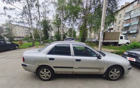 Mitsubishi Carisma I, 2003 год, 200 000 рублей, 18 фотография