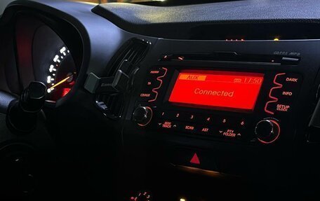 KIA Sportage III, 2012 год, 1 300 000 рублей, 14 фотография