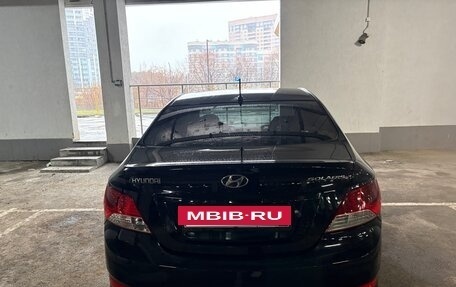 Hyundai Solaris II рестайлинг, 2011 год, 690 000 рублей, 2 фотография