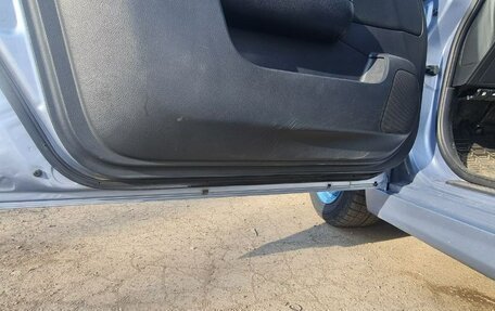 Nissan Tiida, 2010 год, 850 000 рублей, 8 фотография