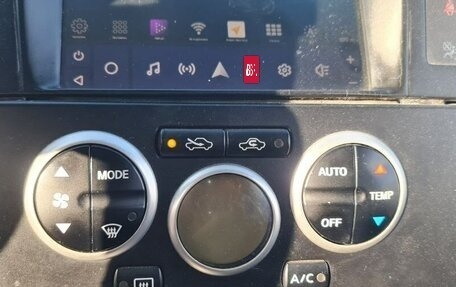 Nissan Tiida, 2010 год, 850 000 рублей, 6 фотография