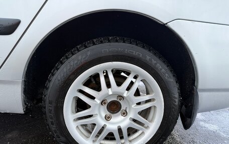 Toyota Corolla, 2003 год, 650 000 рублей, 13 фотография