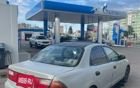 Mazda Protege, 1996 год, 160 000 рублей, 5 фотография