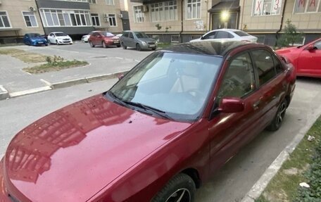 Mitsubishi Mirage VI рестайлинг, 2000 год, 222 222 рублей, 3 фотография