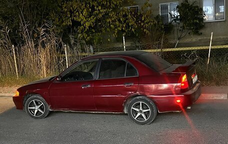 Mitsubishi Mirage VI рестайлинг, 2000 год, 222 222 рублей, 4 фотография