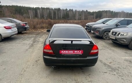 Mitsubishi Mirage VI рестайлинг, 1997 год, 190 000 рублей, 3 фотография