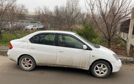 Toyota Prius IV XW50, 1998 год, 250 000 рублей, 3 фотография