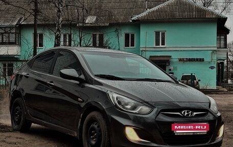 Hyundai Solaris II рестайлинг, 2011 год, 795 000 рублей, 13 фотография