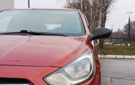 Hyundai Solaris II рестайлинг, 2011 год, 595 000 рублей, 21 фотография