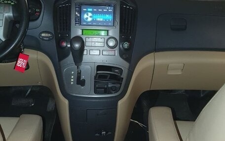 Hyundai Grand Starex Grand Starex I рестайлинг 2, 2011 год, 1 550 000 рублей, 10 фотография