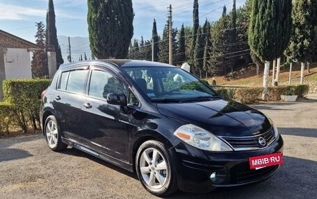 Nissan Tiida, 2009 год, 750 000 рублей, 11 фотография