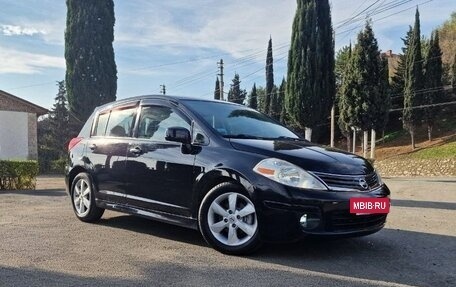 Nissan Tiida, 2009 год, 750 000 рублей, 9 фотография