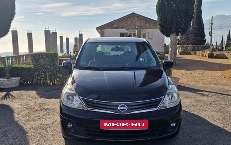 Nissan Tiida, 2009 год, 750 000 рублей, 8 фотография