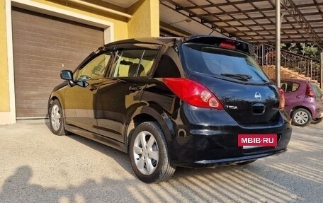 Nissan Tiida, 2009 год, 750 000 рублей, 28 фотография