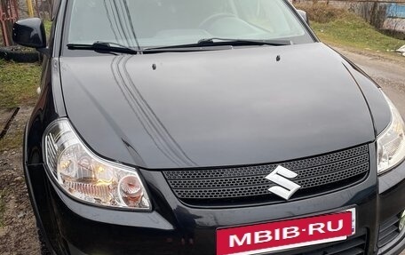 Suzuki SX4 II рестайлинг, 2009 год, 900 000 рублей, 2 фотография
