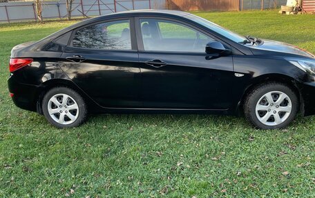 Hyundai Solaris II рестайлинг, 2011 год, 700 000 рублей, 12 фотография