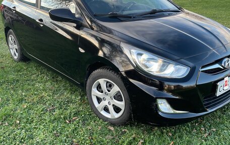 Hyundai Solaris II рестайлинг, 2011 год, 700 000 рублей, 11 фотография