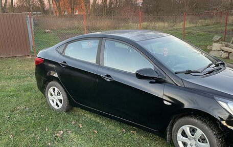 Hyundai Solaris II рестайлинг, 2011 год, 700 000 рублей, 6 фотография