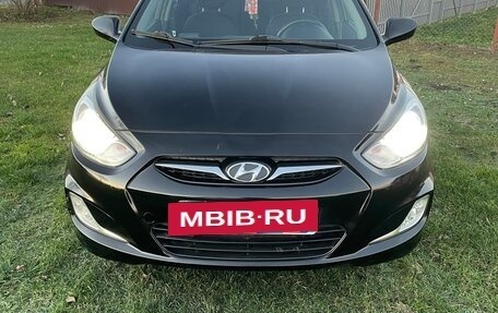 Hyundai Solaris II рестайлинг, 2011 год, 700 000 рублей, 8 фотография