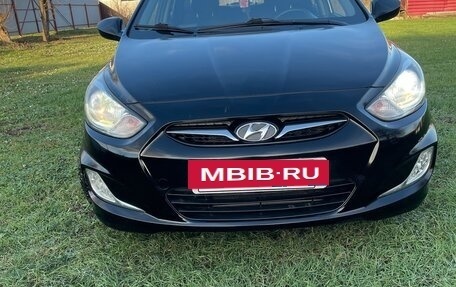 Hyundai Solaris II рестайлинг, 2011 год, 700 000 рублей, 16 фотография