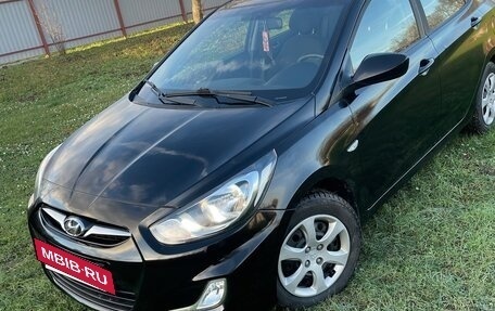 Hyundai Solaris II рестайлинг, 2011 год, 700 000 рублей, 17 фотография