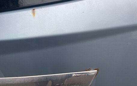 Cadillac SRX II рестайлинг, 2011 год, 900 000 рублей, 10 фотография