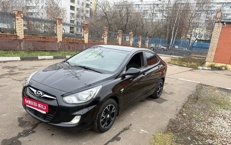 Hyundai Solaris II рестайлинг, 2011 год, 730 000 рублей, 5 фотография
