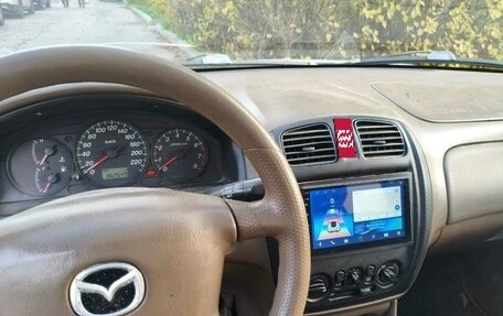 Mazda Protege, 2000 год, 110 000 рублей, 4 фотография