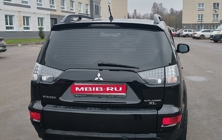 Mitsubishi Outlander III рестайлинг 3, 2011 год, 990 000 рублей, 7 фотография
