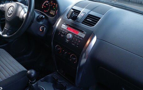 Suzuki SX4 II рестайлинг, 2010 год, 810 000 рублей, 10 фотография