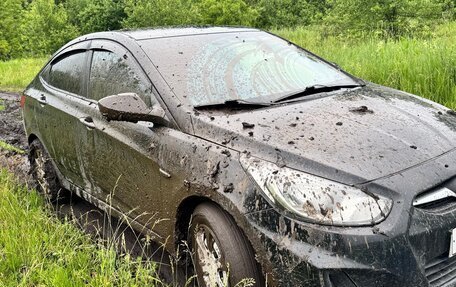 Hyundai Solaris II рестайлинг, 2011 год, 650 000 рублей, 27 фотография