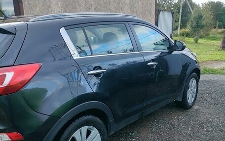 KIA Sportage III, 2012 год, 910 000 рублей, 11 фотография