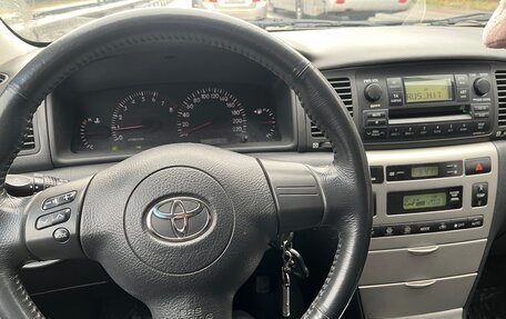 Toyota Corolla, 2004 год, 699 000 рублей, 5 фотография