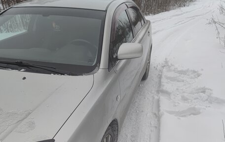 Toyota Avensis III рестайлинг, 2005 год, 650 000 рублей, 23 фотография