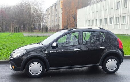 Renault Sandero I, 2013 год, 670 000 рублей, 2 фотография