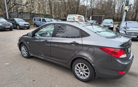 Hyundai Solaris II рестайлинг, 2011 год, 595 000 рублей, 21 фотография
