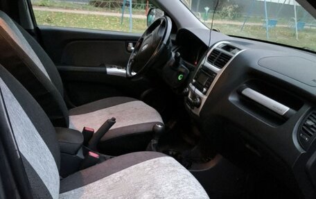 KIA Sportage II, 2009 год, 900 000 рублей, 13 фотография