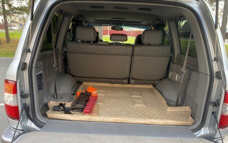 Toyota Land Cruiser 100 рестайлинг 2, 2006 год, 1 870 000 рублей, 13 фотография