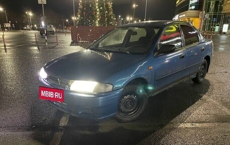 Mazda 323, 1997 год, 118 000 рублей, 4 фотография