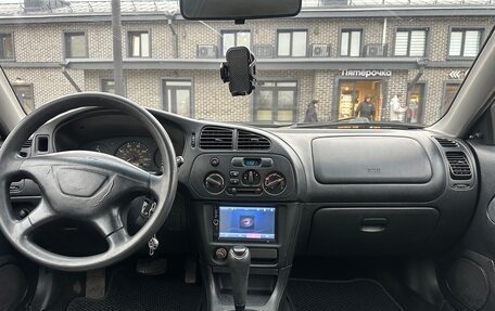 Mitsubishi Mirage VI рестайлинг, 2001 год, 210 000 рублей, 13 фотография
