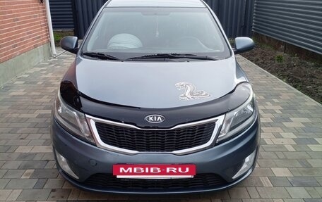 KIA Rio III рестайлинг, 2012 год, 670 000 рублей, 2 фотография
