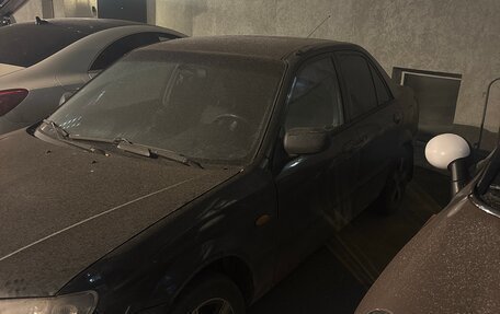 Mazda 323, 2003 год, 200 000 рублей, 3 фотография