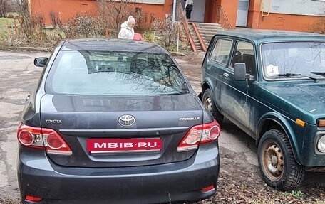 Toyota Corolla, 2011 год, 1 000 000 рублей, 9 фотография