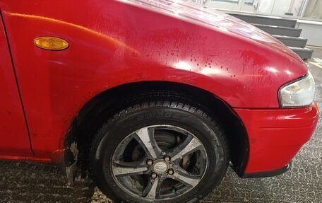 Mazda 323, 1997 год, 185 000 рублей, 16 фотография