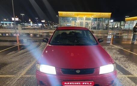 Mazda 323, 1997 год, 185 000 рублей, 14 фотография