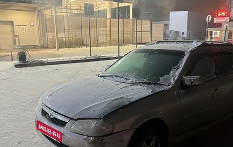 Mazda Familia, 1998 год, 260 000 рублей, 8 фотография