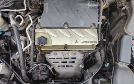 Mitsubishi Outlander III рестайлинг 3, 2006 год, 450 000 рублей, 34 фотография